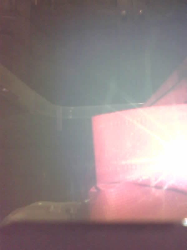 Saved camera frame: a bright light source at the far end of the passage.