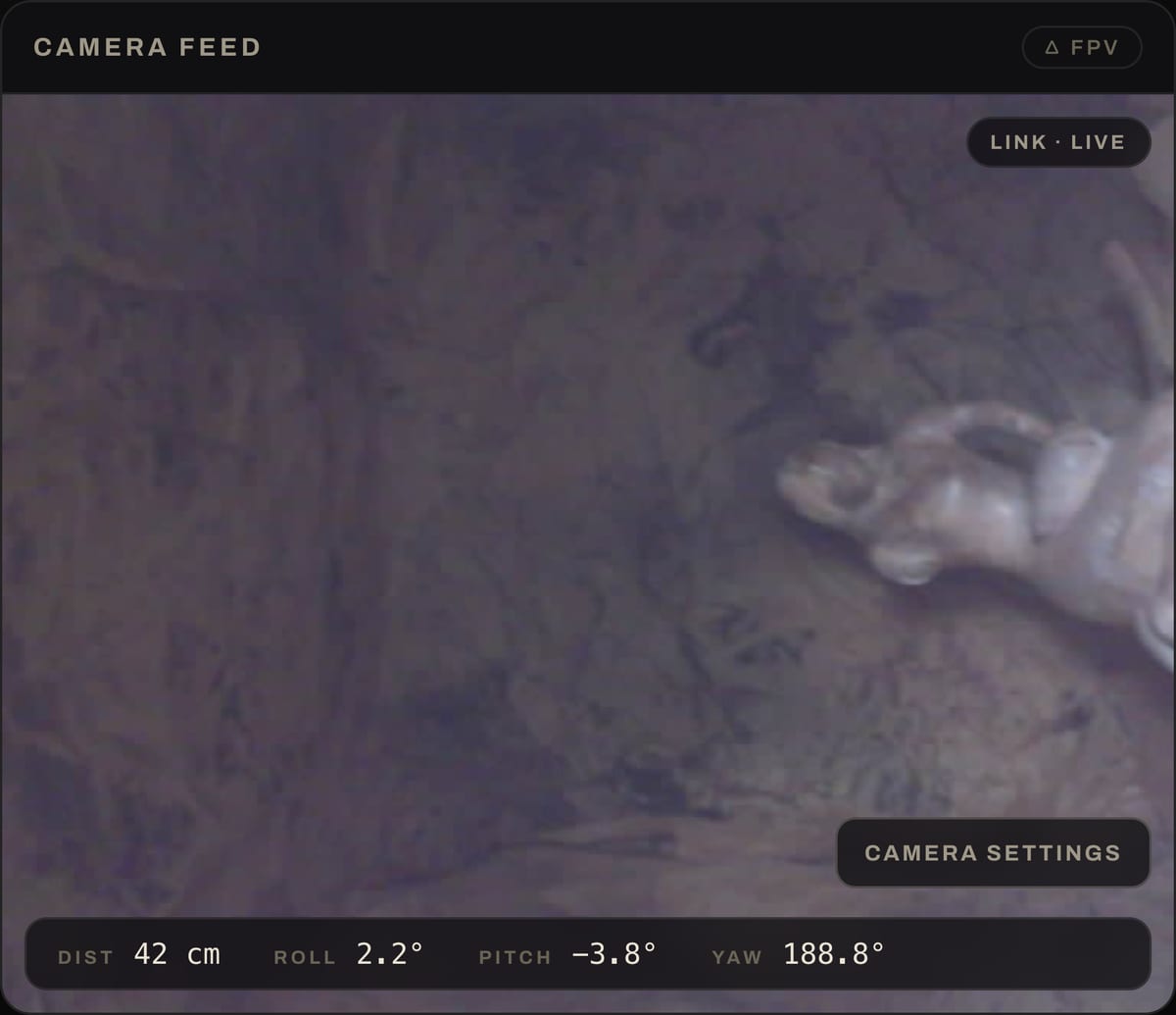 The console camera panel showing a live frame from inside a chamber.